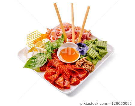 Colorful platter of fresh ingredients with assorted meats and herbs Colorful platter of fresh ingredients with assorted meats and herbs 129060095