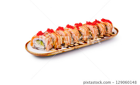 Delicious sushi rolls with salmon and roe on a unique serving platter 129060148