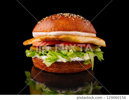 Delicious chicken sandwich with fresh vegetables and creamy dressing Delicious chicken sandwich with fresh vegetables and creamy dressing 129060156