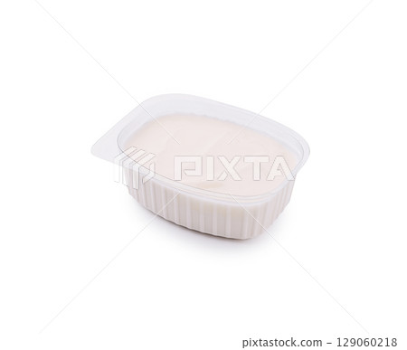 Creamy dessert in container ready to serve at party or gathering Creamy dessert in container ready to serve at party or gathering 129060218