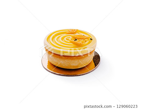 Delicious lemon tart with creamy topping and citrus garnishes 129060223