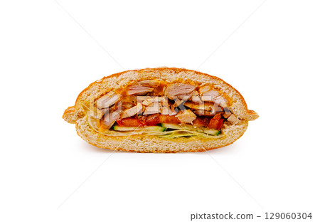 Savory chicken sandwich with fresh ingredients and whole grain bread 129060304