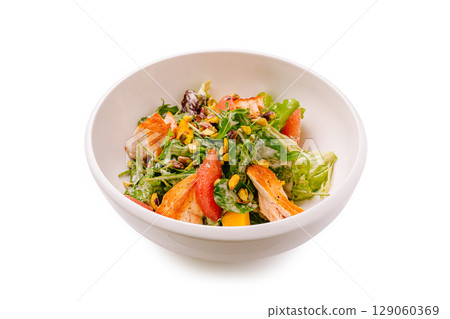 Healthy salad with grilled chicken and mixed greens served in a bowl Healthy salad with grilled chicken and mixed greens served in a bowl 129060369