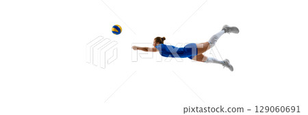 Female athlete diving to hit volleyball in mid-air action on white background. Banner Female athlete diving to hit volleyball in mid-air action on white background. Banner 129060691