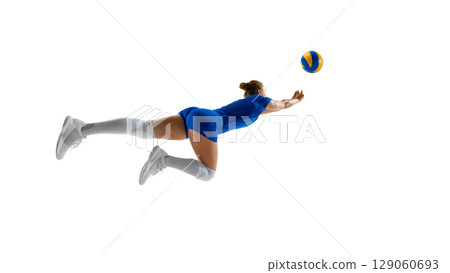 Female volleyball player diving to save ball against white background Female volleyball player diving to save ball against white background 129060693