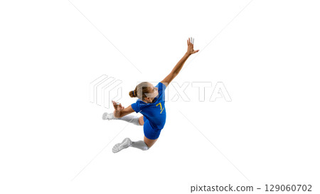 Blue-clad female athlete performing dynamic mid-air jump against white background 129060702