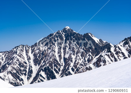 Mount Tsurugi and Mount Mae-Tsurugi seen from Mount Oku-Dainichi - Climbing Mount Oku-Dainichi in the Northern Alps during the remaining snow season 129060931