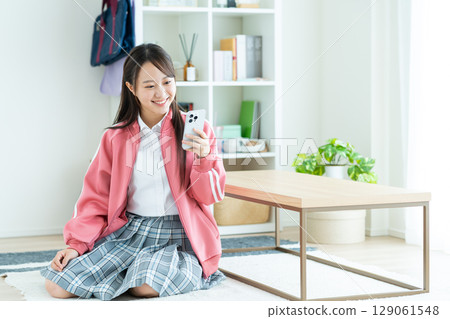 High school girl relaxing in a room 129061548