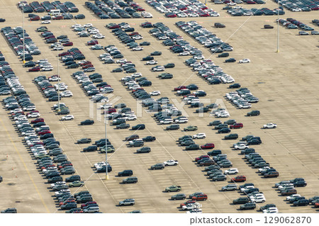 New cars for distribution at factory parking lot New cars for distribution at factory parking lot 129062870