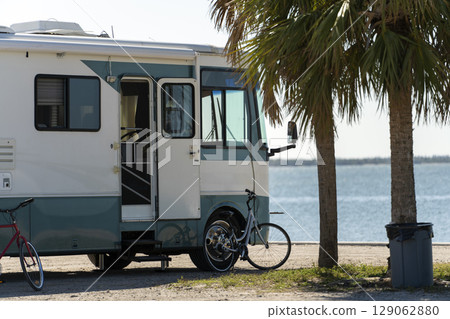 Motorhome on seaside parking lot in Florida. USA travel destination. Motorhome on seaside parking lot in Florida. USA travel destination. 129062880