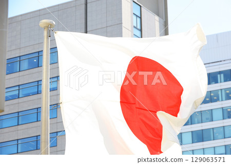 Japanese flag fluttering in the wind 129063571