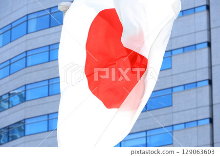 Japanese flag fluttering in the wind Japanese flag fluttering in the wind 129063603