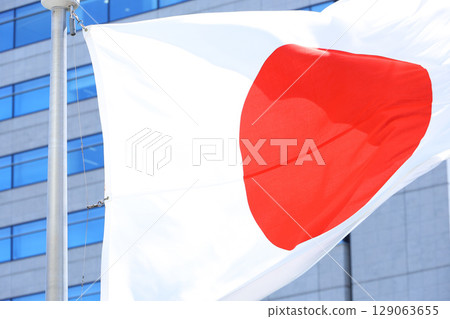 Japanese flag fluttering in the wind Japanese flag fluttering in the wind 129063655