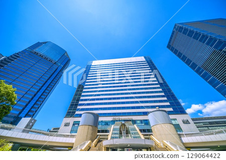 Tokyo cityscape in July. Extremely hot... View of Shinagawa Station and office buildings. Towards a new era = 26th 129064422