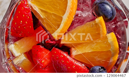 glass of drink with fruits glass of drink with fruits 129064467