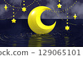 A fantastic sight of a yellow crescent moon and stars floating in the night sky 129065101