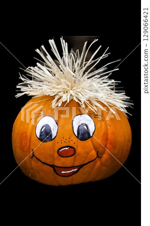 Artistic Pumpkin with Straw Hair 129066421