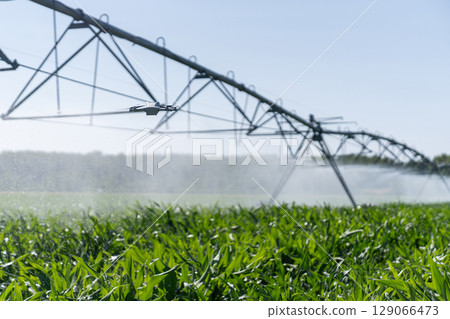Drone controls pivot irrigation system on an agricultural field 129066473