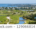 Large golf course and sports grounds with green grass in Boca Grande, small town on Gasparilla Island in southwest Florida 129066814