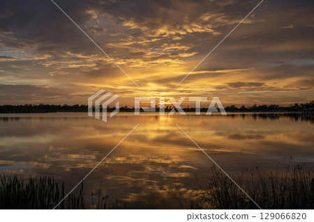 Lake sunset in Wellen park in North Port, Florida 129066820