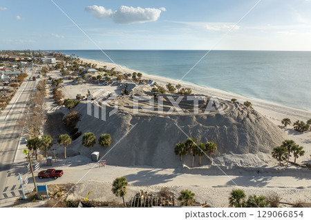 Hurricane Milton aftermath cleanup. Sand piles at Englewood Beach on Manasota Key. Sand recipient site after storm surge Hurricane Milton aftermath cleanup. Sand piles at Englewood Beach on Manasota Key. Sand recipient site after storm surge 129066854