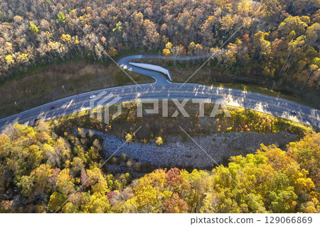 Highway road in USA. American freeway road with fast driving cars. Transportation infrastructure in North Carolina Appalachian mountains Highway road in USA. American freeway road with fast driving cars. Transportation infrastructure in North Carolina Appalachian mountains 129066869