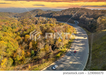 Highway road in USA. American freeway road with fast driving cars. Transportation infrastructure in North Carolina Appalachian mountains 129066870