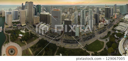 Evening urban landscape of downtown district of Miami Brickell in Florida, USA. Skyline with high skyscraper buildings in modern American megapolis Evening urban landscape of downtown district of Miami Brickell in Florida, USA. Skyline with high skyscraper buildings in modern American megapolis 129067005