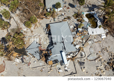 Destroyed houses on ocean coast. Hurricane Milton consequences in Englewood, Florida. Storm surge severe damage Destroyed houses on ocean coast. Hurricane Milton consequences in Englewood, Florida. Storm surge severe damage 129067040