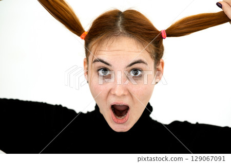 Close up portrait of pretty redhead teenage girl. Close up portrait of pretty redhead teenage girl. 129067091