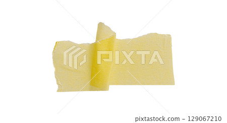 Yellow painter's tape isolated on white background, macro. Torn, crumpled, twisted strips of yellow painter's tape on white background Yellow painter's tape isolated on white background, macro. Torn, crumpled, twisted strips of yellow painter's tape on white background 129067210