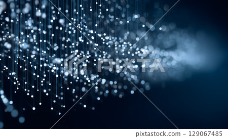Mesmerizing data flow visualization with streaming particles creating dynamic effect in dark blue background 129067485
