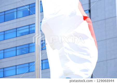 Japanese flag fluttering in the wind 129068944