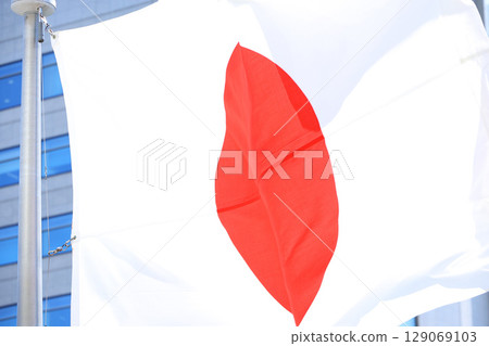 Japanese flag fluttering in the wind Japanese flag fluttering in the wind 129069103