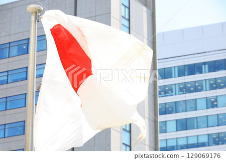 Japanese flag fluttering in the wind Japanese flag fluttering in the wind 129069176