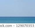 Yacht floating on turquoise waters 129070353