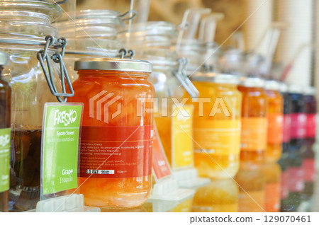 Colorful homemade fruit jam in jars Colorful homemade fruit jam in jars 129070461