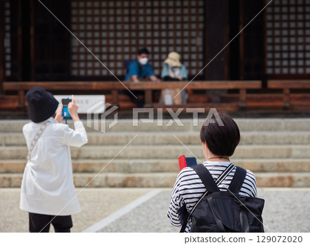Tourists visiting Sanjusangendo Temple, a popular tourist spot in Kyoto 129072020