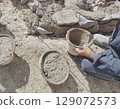 worker use water pipe in construction site 129072573