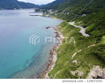 Aerial view of Yakatame Park, Nakadori Island, Nagasaki Prefecture, Japan, with a drone and beautiful coastline Aerial view of Yakatame Park, Nakadori Island, Nagasaki Prefecture, Japan, with a drone and beautiful coastline 129072591