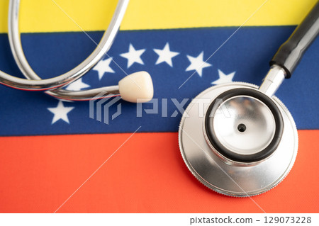 Stethoscope on Venezuela flag, business and finance. Stethoscope on Venezuela flag, business and finance. 129073228