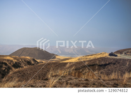 March 25 2025 Burnt Grassland Landscape Under a Clear Blue Sky, Japan 129074812