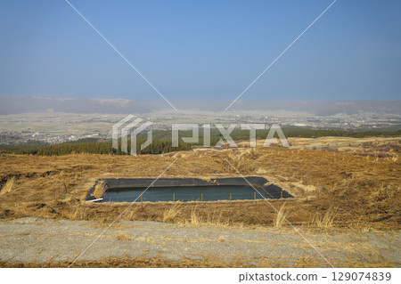 March 25 2025 Scenic View of Rural Landscape with Pond and Distant Horizon, Japan March 25 2025 Scenic View of Rural Landscape with Pond and Distant Horizon, Japan 129074839