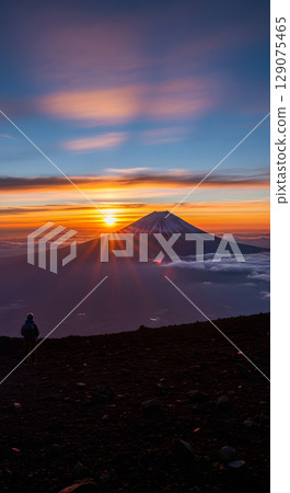 Lake Yamanaka and climbers in the morning glow seen from Mount Hoei Lake Yamanaka and climbers in the morning glow seen from Mount Hoei 129075465