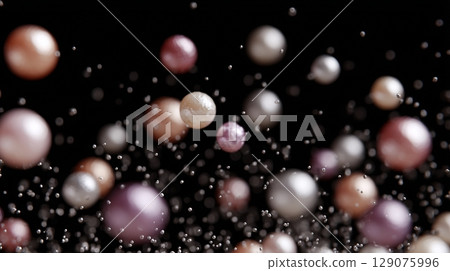 彩色珍珠飛舞,珍珠和水滴漂浮在黑色背景上 彩色珍珠飛舞,珍珠和水滴漂浮在黑色背景上 129075996