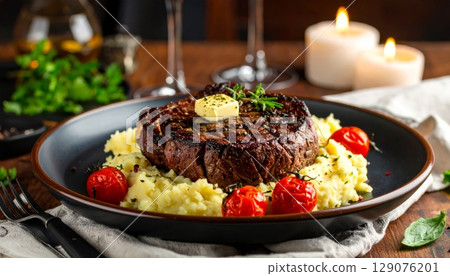 Delicious meat and vegetable dishes, including lamb chops, for a gourmet meal 129076201