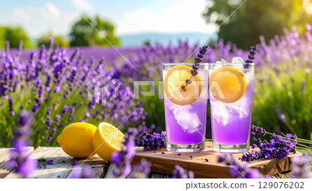 Fresh lavender lemoned with lemons, lavender field background 129076202