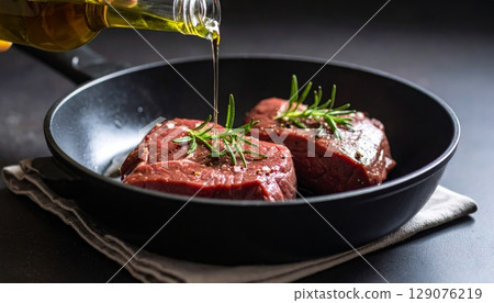 A sizzling beef steak and vibrant pan-fried vegetables create a healthy, delicious meal 129076219