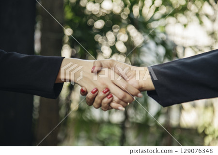 Banner Trust honesty business customer handshake together promise partner. Panorama Businessman teamwork diversity solidarity team Partner hands together. Team meeting shaking hands with copy space 129076348