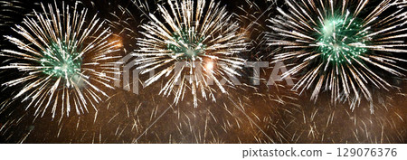 Banner Golden Firework celebrate anniversary independence day night time celebrate national holiday. Countdown 2024 party time event. Happy new year 2025 4th of july holiday festival with copy space 129076376